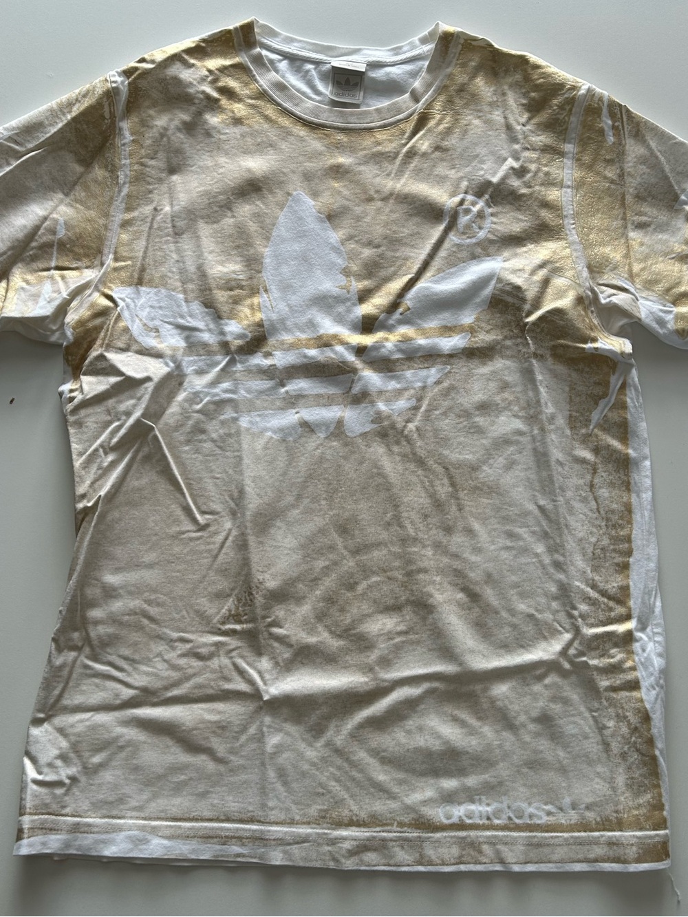 Adidas White Tee with Gold Detail and Blue Tag